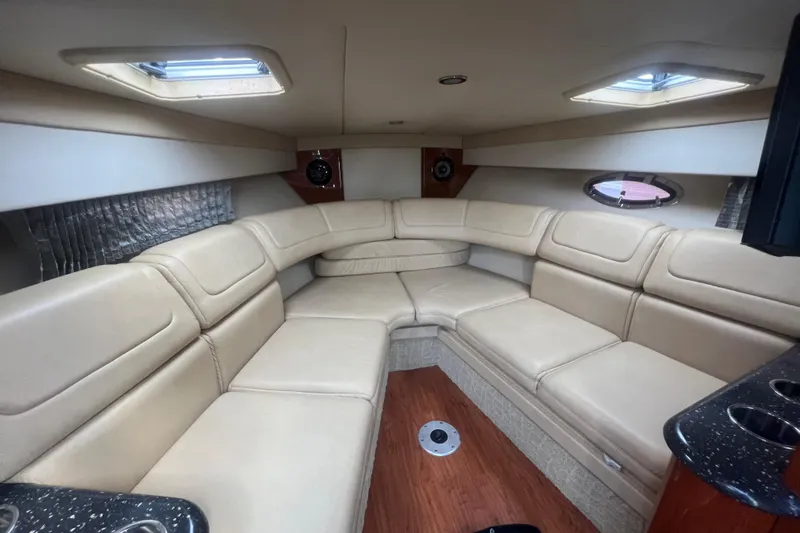 Slide: The Image of Luxurious interior of a 2008 Formula 310 Sun Sport boat with beige seating. - 43