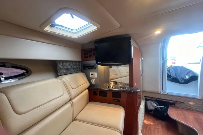 Slide: The Image of Interior of a 2008 Formula 310 Sun Sport boat with seating and entertainment area. - 52