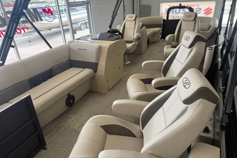 Slide: The Image of Luxurious interior of 2026 Bentley Pontoons Legacy 243 DL Navigator with plush seating. - 2