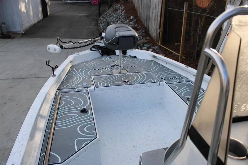 Slide: The Image of 2021 Xpress H22B Bay boat deck with SeaDek flooring and trolling motor. - 4