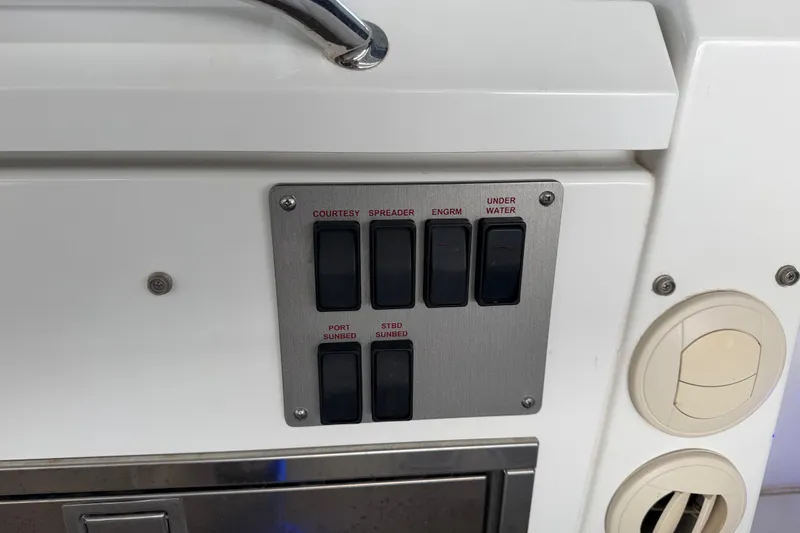 Slide: The Image of 2015 Cruisers Yachts 390 Express Coupe interior with cushioned seating and wooden table. - 11