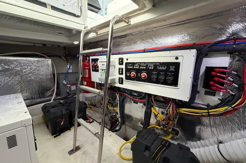 Slide: The Image of 2015 Cruisers Yachts 390 Express Coupe helm with modern controls and waterfront view. - 13