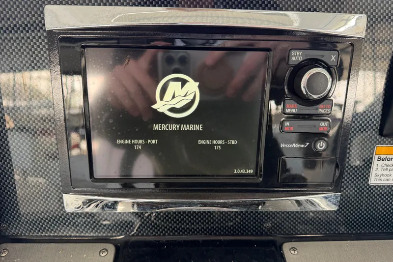 Slide: The Image of 2015 Cruisers Yachts 390 Express Coupe docked in a marina, showcasing sleek design. - 16