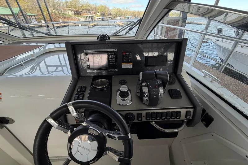 Slide: The Image of Engine room of 2015 Cruisers Yachts 390 Express Coupe with control panel and wiring. - 19