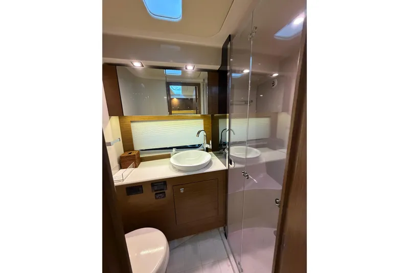 Slide: The Image of Luxurious bathroom interior of 2015 Cruisers Yachts 390 Express Coupe with modern fixtures. - 23