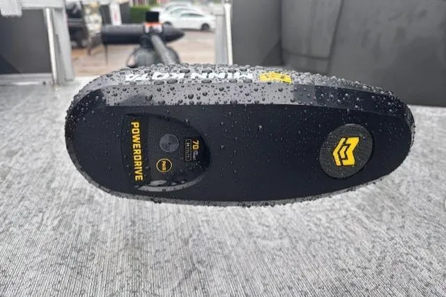 Slide: The Image of Close-up of a wet PowerDrive motor on a 2026 Sun Tracker Fishin' Barge 22 DLX. - 22