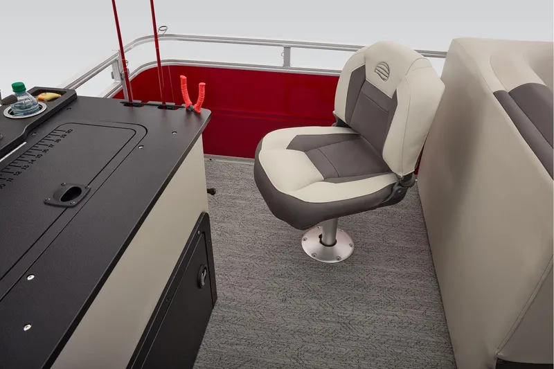 Slide: The Image of Manufacturer Provided Image: 2026 Sun Tracker Fishin' Barge 22 DLX interior with swivel seat and fishing station. - 80