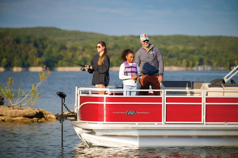Slide: The Image of Manufacturer Provided Image: Family fishing on 2026 Sun Tracker Fishin' Barge 22 DLX pontoon boat. - 95