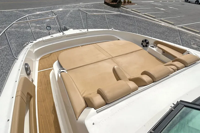 Slide: The Image of 2022 Sea Ray Sundancer 320 Outboard with spacious sunbathing deck and luxurious seating. - 19