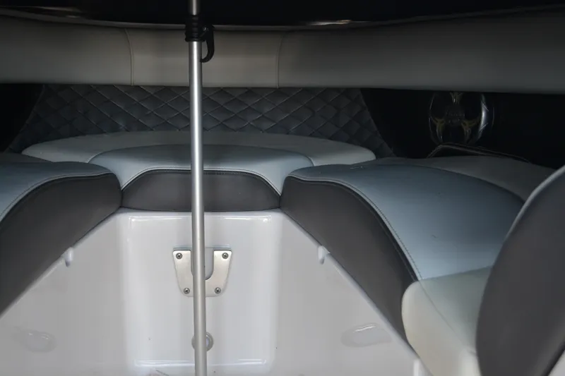 Slide: The Image of Interior seating of 2014 Regal 2300 Bowrider boat, featuring cushioned upholstery and sleek design. - 6