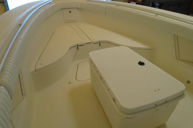 Slide: The Image of 2004 Hydra-Sports Vector 3300 CC boat interior with seating and storage compartments. - 19