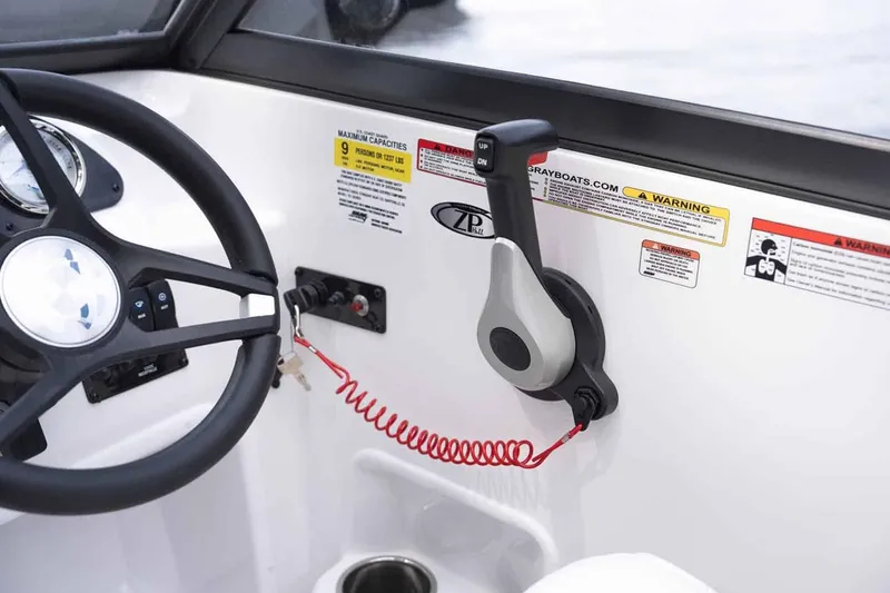 Slide: The Image of Interior view of 2026 Stingray 191 DC boat controls. - 10