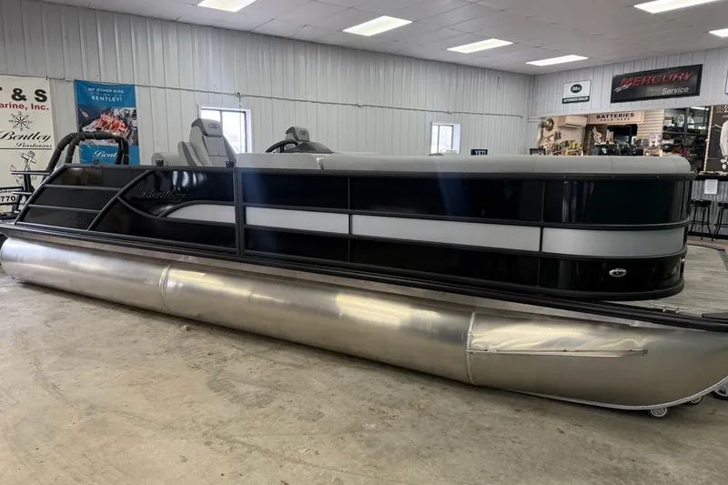 The Image of 2026 Bentley Pontoons Legacy 243 Swingback in showroom, showcasing sleek design and modern features. - 0