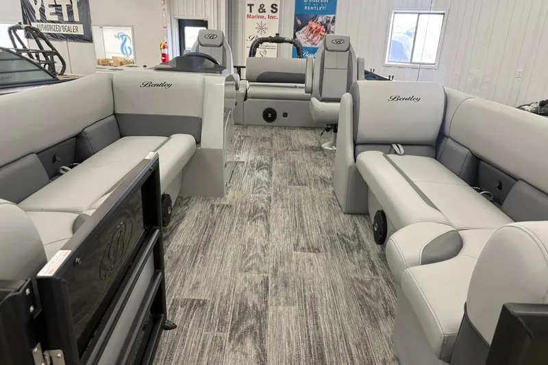 Slide: The Image of 2026 Bentley Pontoons Legacy 243 Swingback interior with luxurious gray seating and modern design. - 3