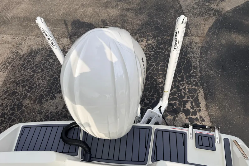Slide: The Image of Top view of a 2026 Pathfinder 2400 TRS boat with Power-Pole anchors. - 14