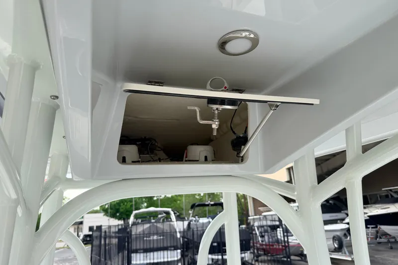 Slide: The Image of Open storage compartment on 2026 Pathfinder 2400 TRS boat, showcasing interior details. - 25