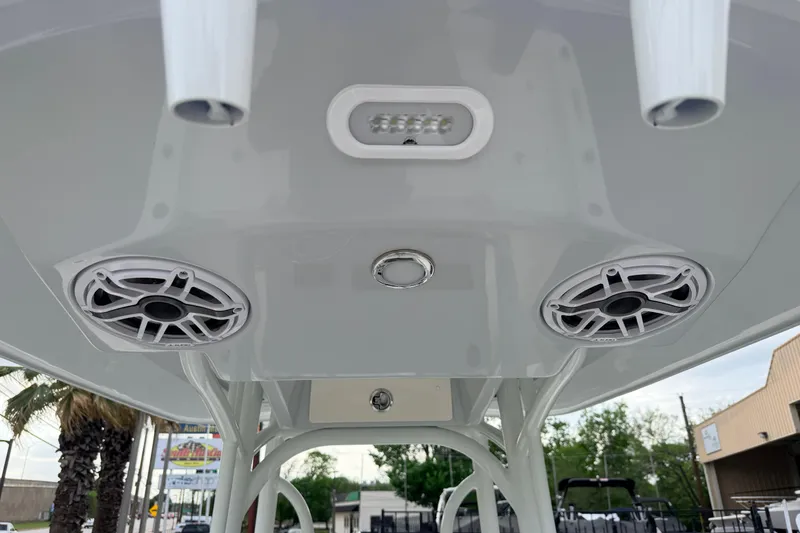 Slide: The Image of T-top speakers and lights on a 2026 Pathfinder 2400 TRS boat. - 29