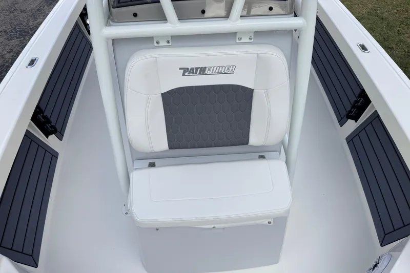 Slide: The Image of 2026 Pathfinder 2400 TRS boat seat with gray and white upholstery, showcasing sleek design. - 32