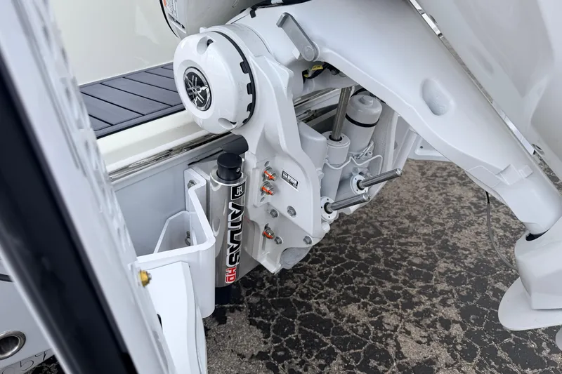 Slide: The Image of Close-up of 2026 Pathfinder 2400 TRS boat engine and hydraulic system. - 4