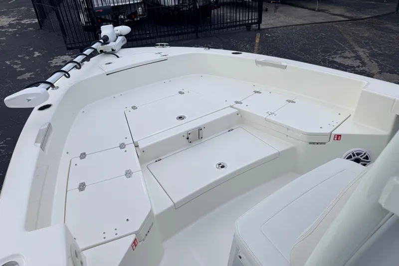 Slide: The Image of 2026 Pathfinder 2400 TRS boat interior with spacious deck and storage compartments. - 49