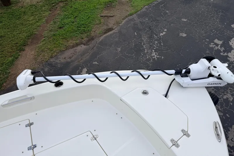 Slide: The Image of 2026 Pathfinder 2400 TRS boat with Garmin trolling motor on deck. - 61