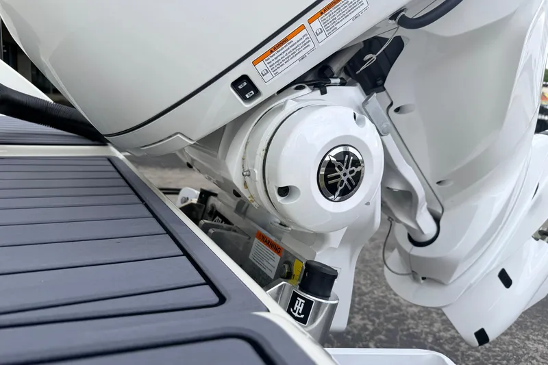 Slide: The Image of Close-up of a 2026 Pathfinder 2400 TRS boat engine detail. - 7