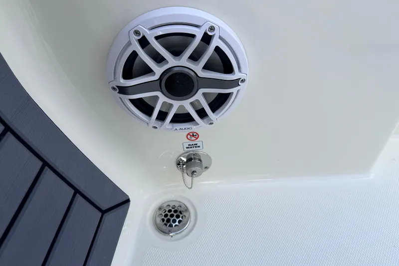 Slide: The Image of Speaker and raw water outlet on 2026 Pathfinder 2400 TRS boat. - 70