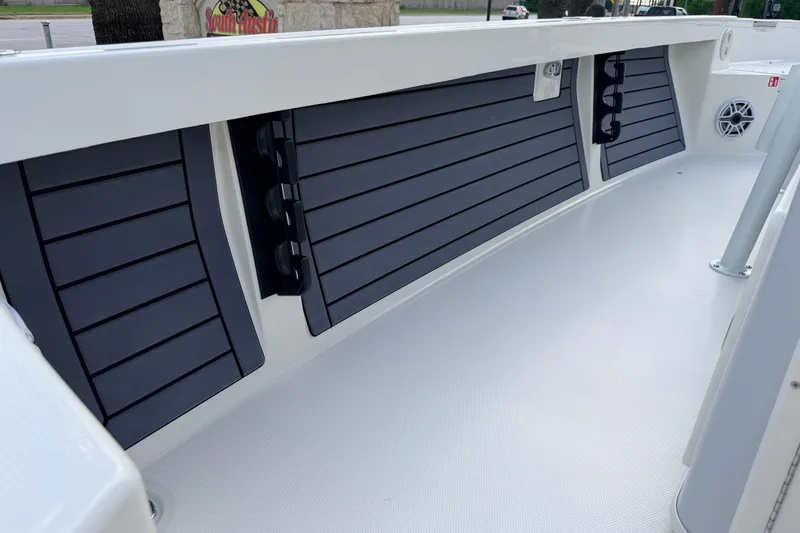 Slide: The Image of 2026 Pathfinder 2400 TRS boat interior with sleek, modern design and storage compartments. - 73