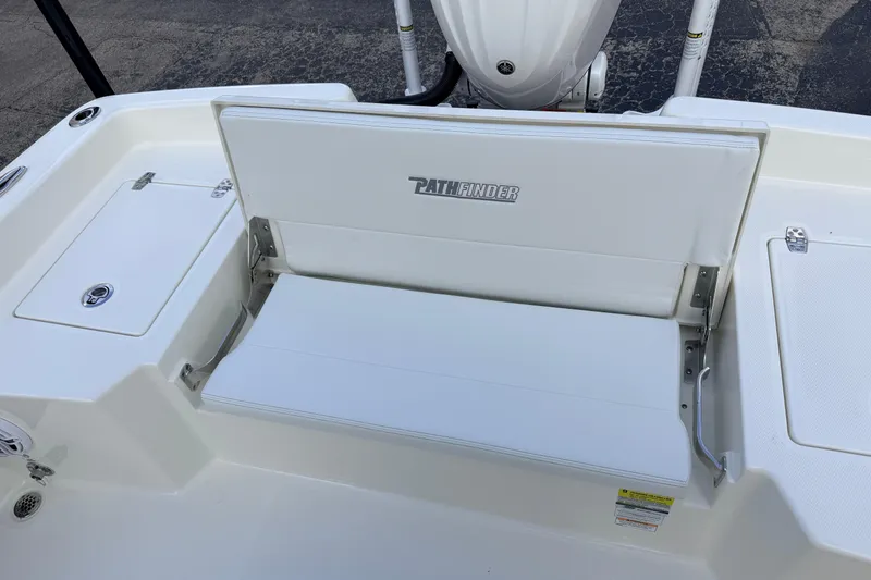 Slide: The Image of 2026 Pathfinder 2400 TRS boat seat and storage compartments, showcasing sleek design and functionality. - 74