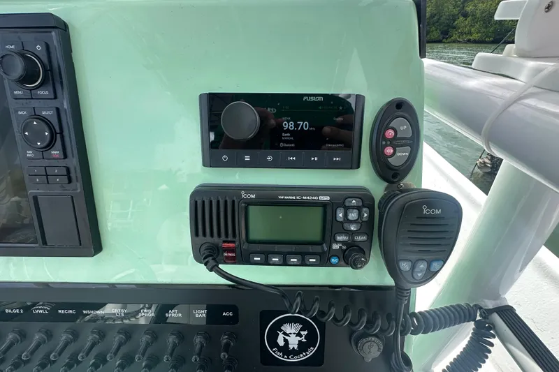 Slide: The Image of Control panel of 2023 Blazer Bay 2400 boat with radio and navigation equipment. - 15