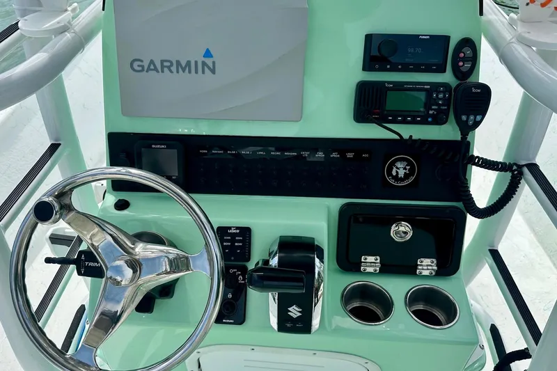 Slide: The Image of Control panel of 2023 Blazer Bay 2400 boat with Garmin navigation system. - 32