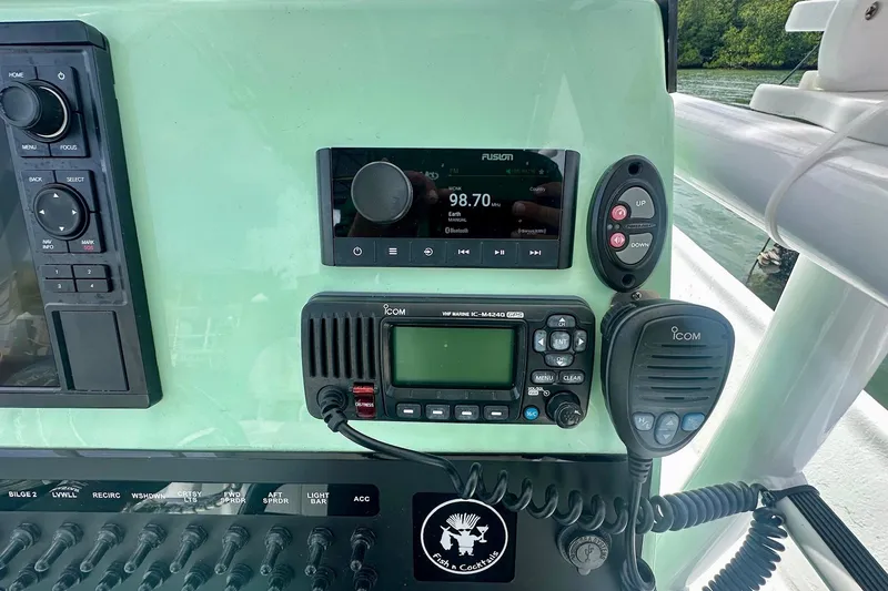 Slide: The Image of Control panel of 2023 Blazer Bay 2400 boat with radio and navigation equipment. - 45