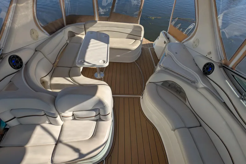 Slide: The Image of Luxurious interior of 2001 Wellcraft 3300 Martinique boat with plush seating and table. - 15