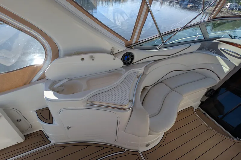 Slide: The Image of Luxurious interior of 2001 Wellcraft 3300 Martinique yacht with elegant seating and wood accents. - 18