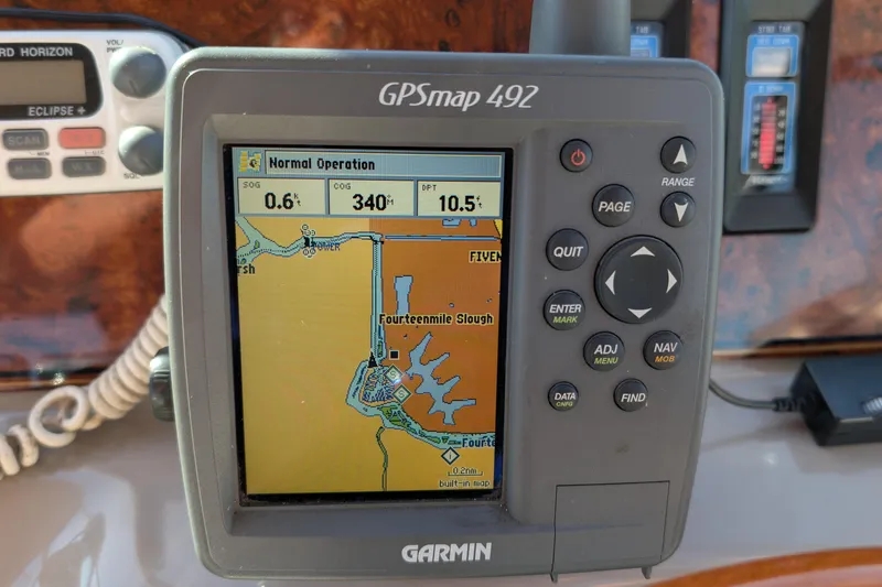Slide: The Image of Garmin GPSmap 492 on 2001 Wellcraft 3300 Martinique boat, displaying navigation map. - 30