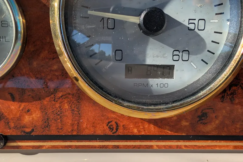 Slide: The Image of Close-up of a 2001 Wellcraft 3300 Martinique boat tachometer displaying RPM. - 33