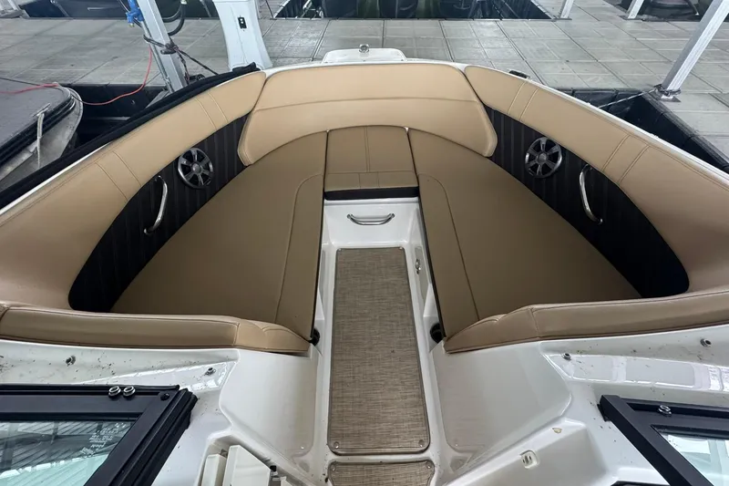 Slide: The Image of Interior view of 2020 Sea Ray SPX 230 boat with tan seating and modern design. - 6