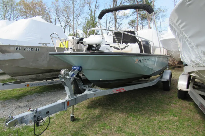 The Image of 2023 Boston Whaler 170 Montauk boat on trailer, parked outdoors. - 0