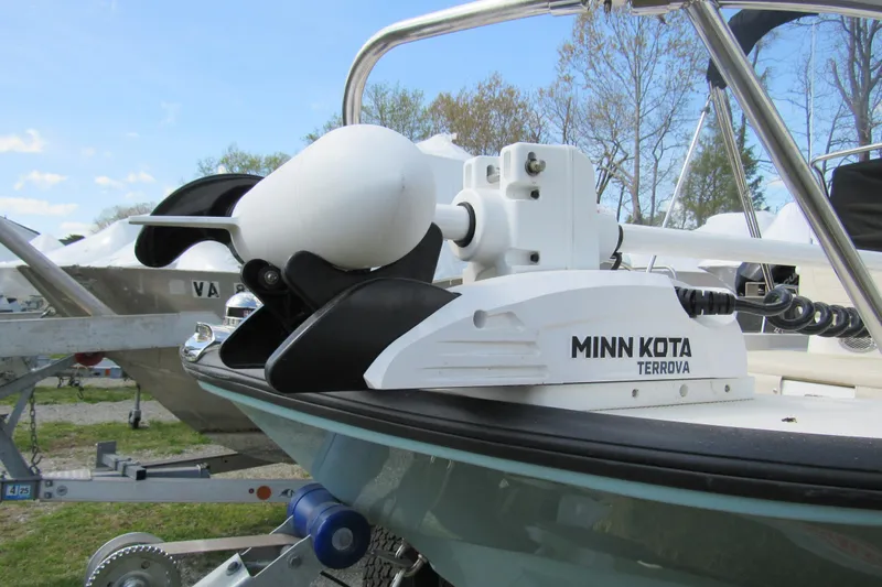 Slide: The Image of 2023 Boston Whaler 170 Montauk with Minn Kota Terrova trolling motor on trailer. - 3