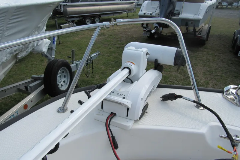 Slide: The Image of 2023 Boston Whaler 170 Montauk boat with mounted trolling motor on deck. - 9