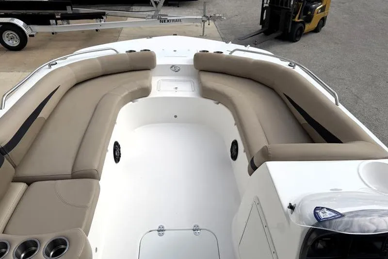 Slide: The Image of 2023 Hurricane SunDeck Sport 201 OB boat with spacious seating and cup holders. - 14