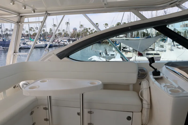 Slide: The Image of Interior view of a 2007 Tiara 4200 Open yacht, featuring a sleek seating area. - 21