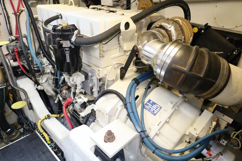 Slide: The Image of Engine room of a 2005 Tiara Yachts 4200 Open, showcasing detailed machinery components. - 34