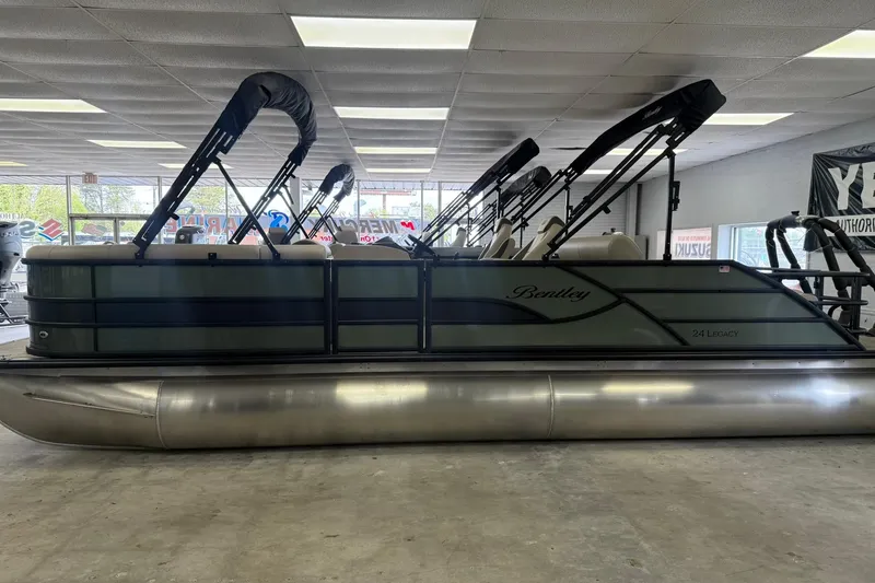 Slide: The Image of 2026 Bentley Pontoons Legacy 243 Swingback pontoon boat in showroom. - 2