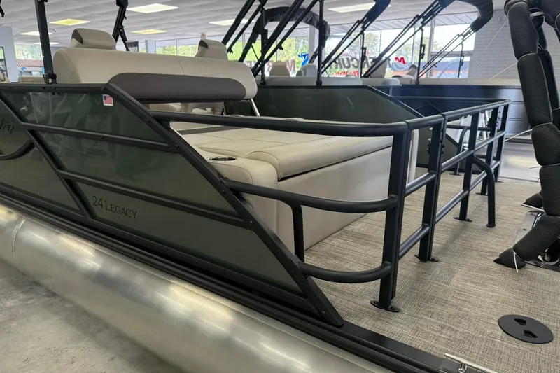 Slide: The Image of 2026 Bentley Pontoons Legacy 243 Swingback interior with seating and railing. - 3