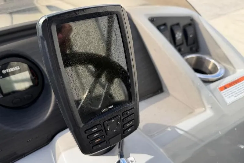 Slide: The Image of Garmin device on 2023 Bennington 22SSR boat dashboard with Yamaha gauge. - 19
