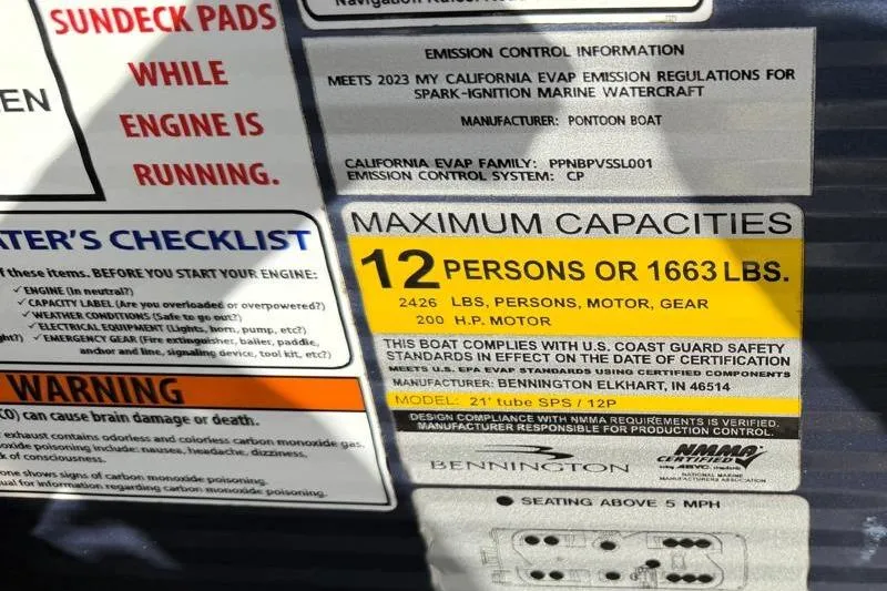 Slide: The Image of Capacity label for 2023 Bennington 22SSR, maximum 12 persons or 1663 lbs, 200 HP motor. - 21