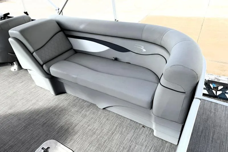 Slide: The Image of 2023 Bennington 22SSR pontoon boat with sleek gray seating and modern design. - 25