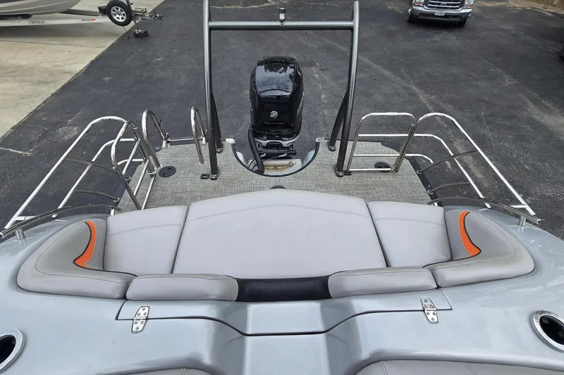 Slide: The Image of 2021 Berkshire 25 Sport CL DC 3.0+ pontoon boat with sleek seating and powerful outboard motor. - 14