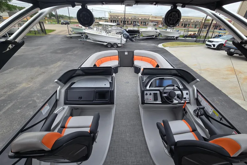 Slide: The Image of 2021 Berkshire 25 Sport CL DC 3.0+ pontoon boat interior with modern seating and controls. - 19